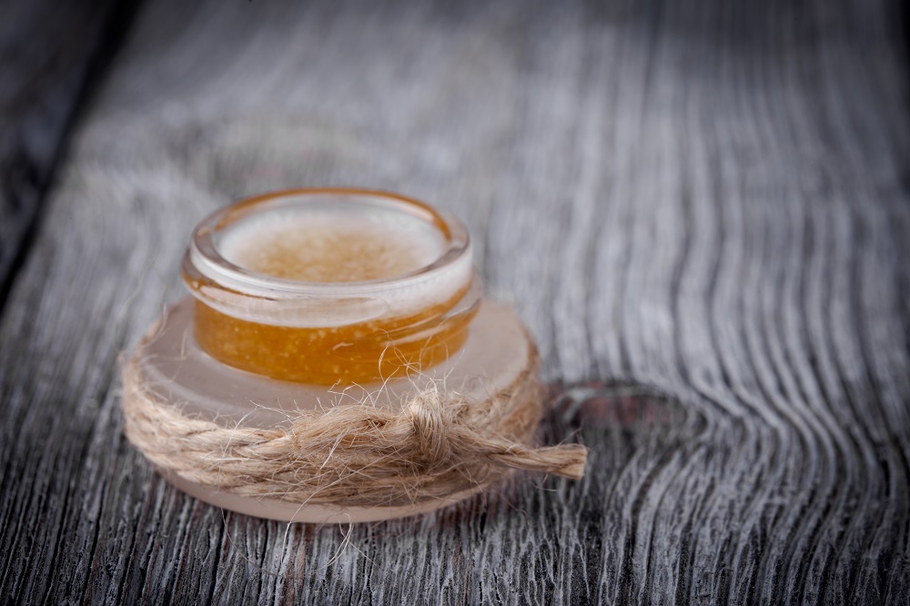 Handmade DIY natural sugar lip scrub with honey and coconut oil