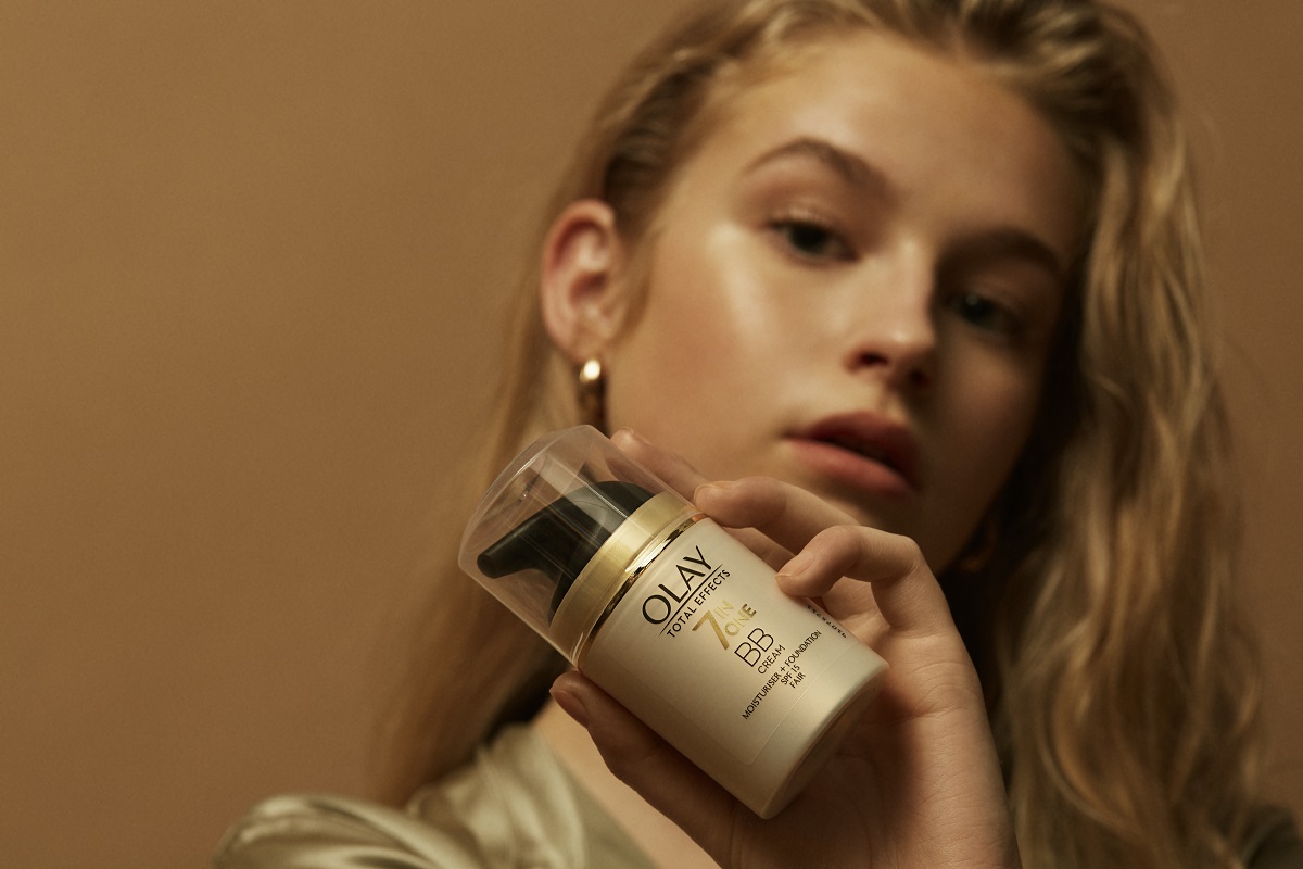 Model holding CC cream