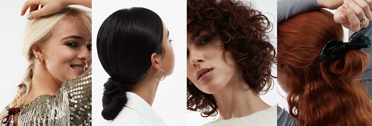 four female models with blonf, black, brunette and red hair